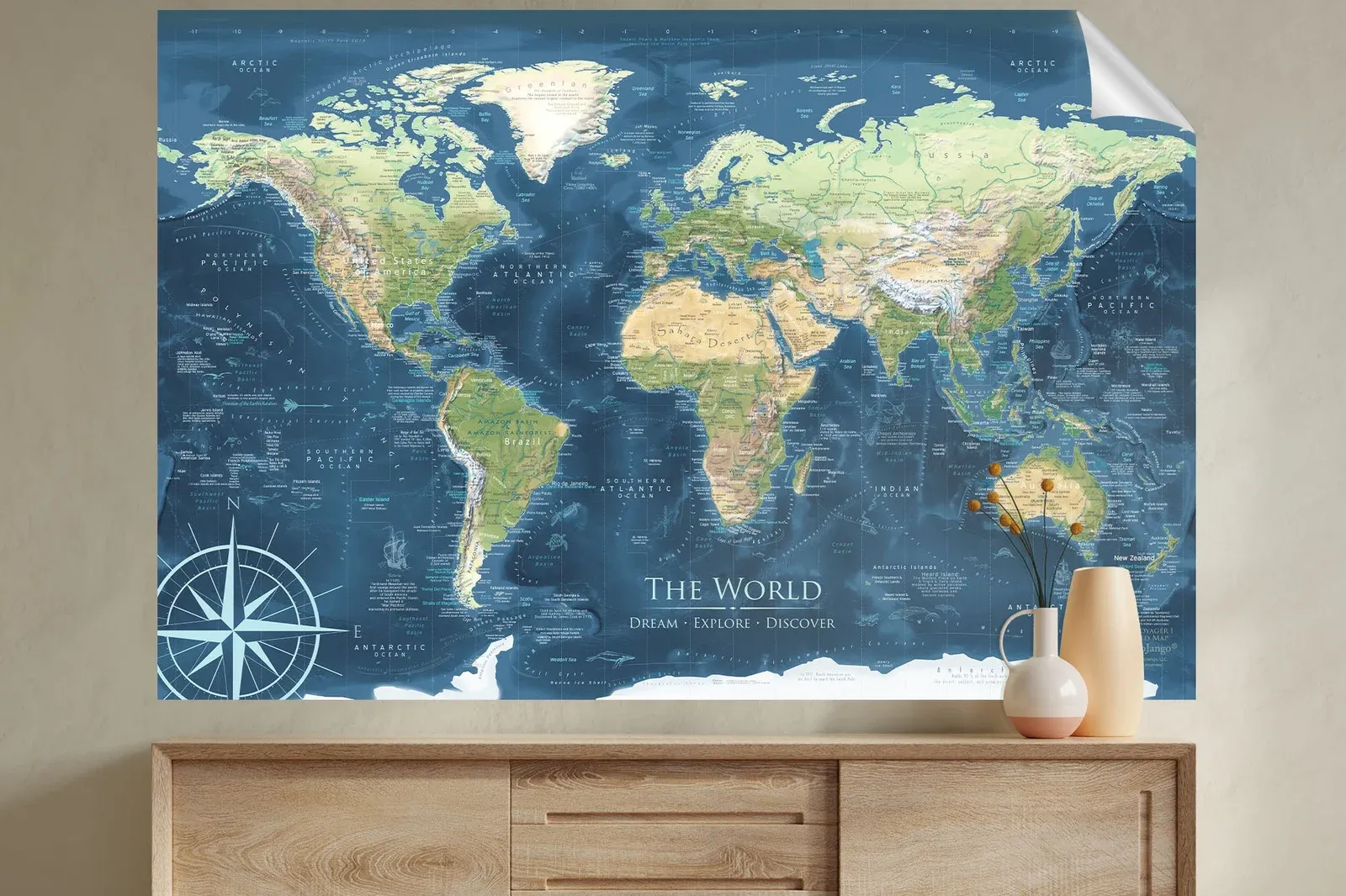 Detailed blue GeoJango world map decal applied above a wooden cabinet